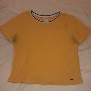 yellow short sleeved shirt